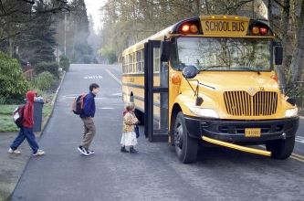 Kids Getting on School Bus